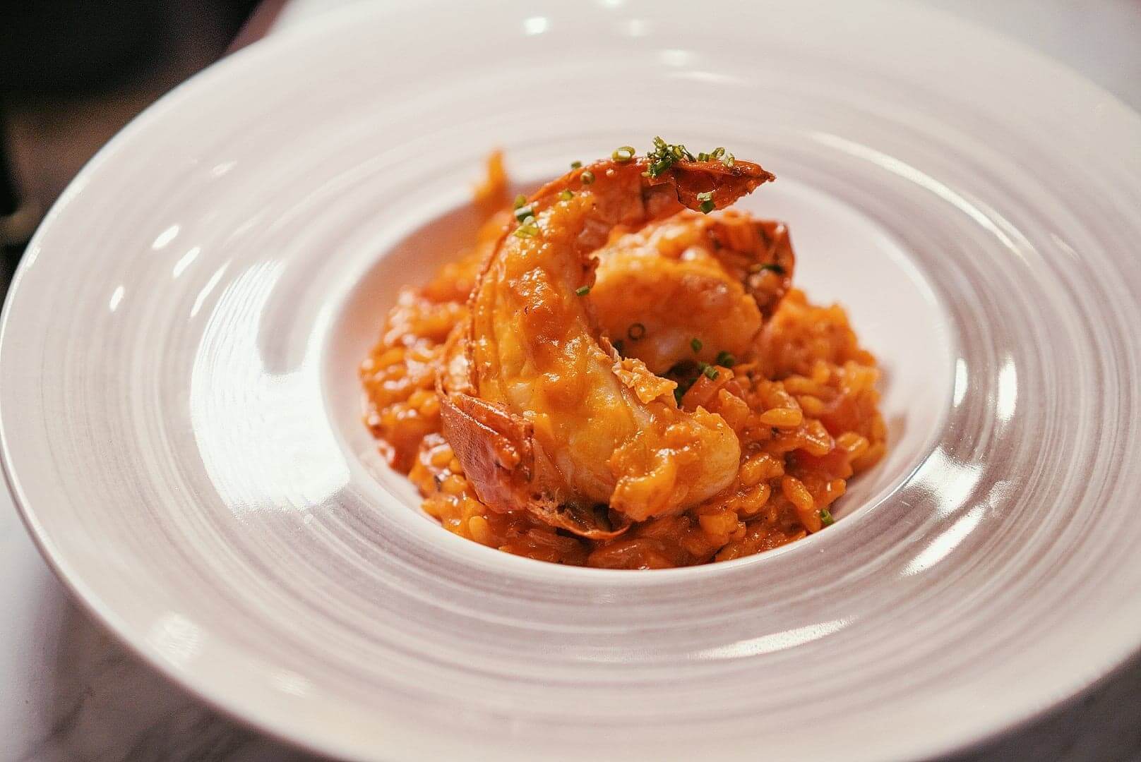 用上龍蝦頭膏煮嘅芡汁，份外鮮甜。